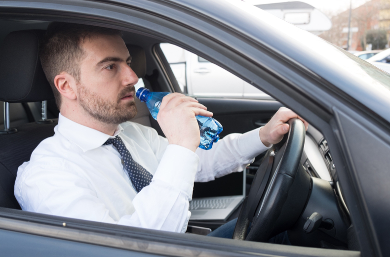 Driver_staying_hydrated_with_water
